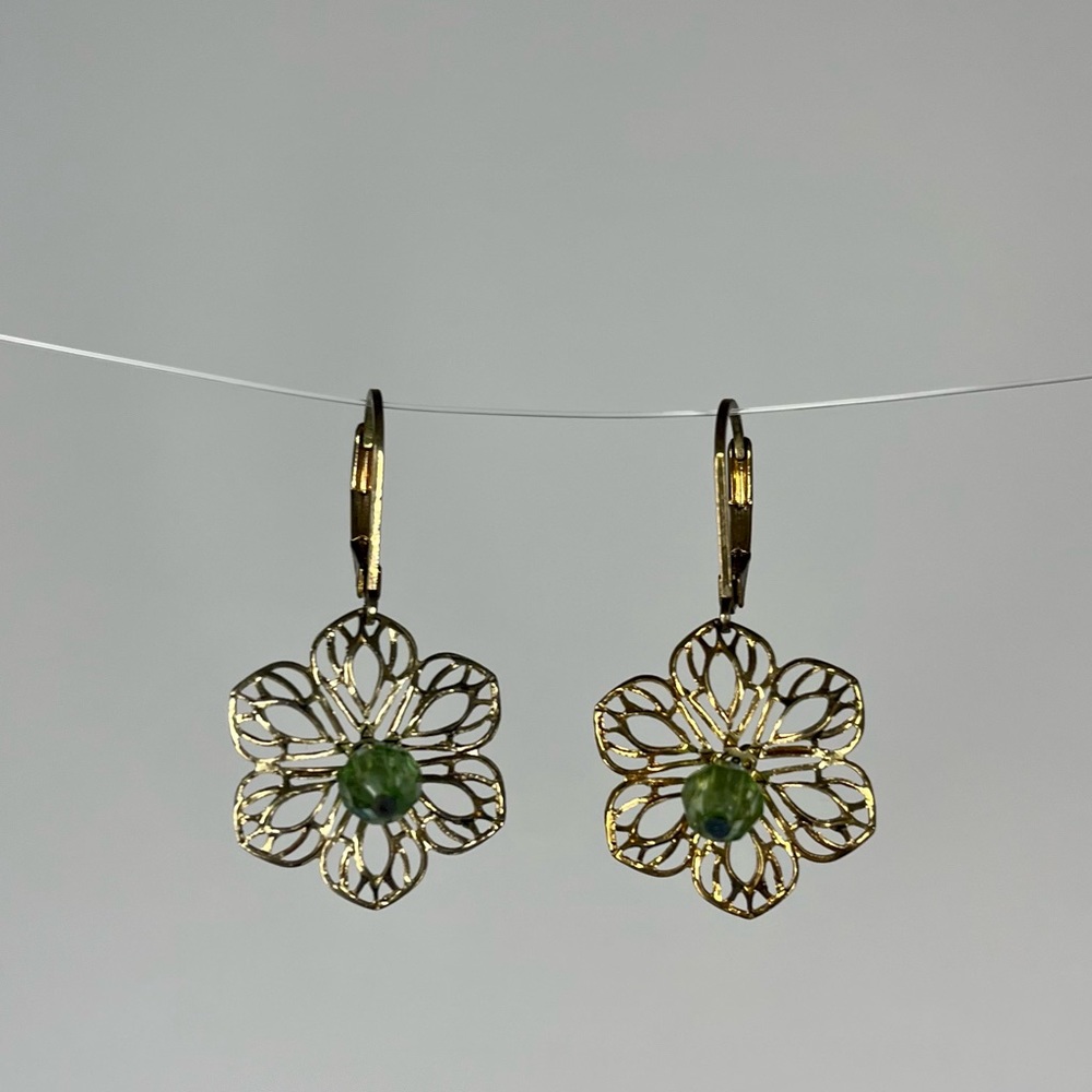 Delicate gold flower earring with green bead center
